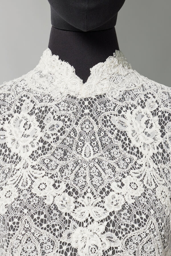 Lace enriched tulle.