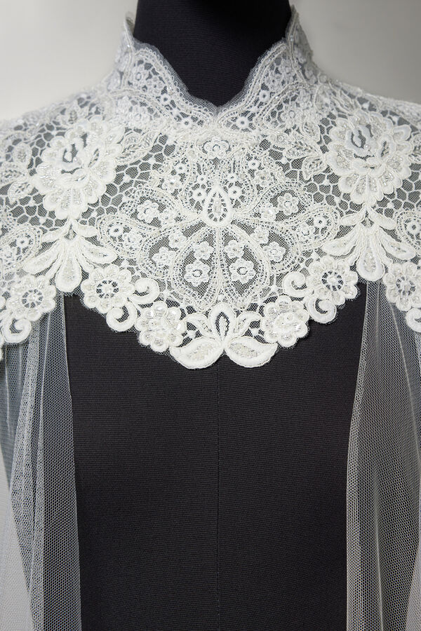 Cape with tulle wings