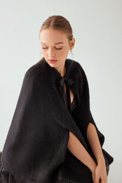 Faux fur cape with bow