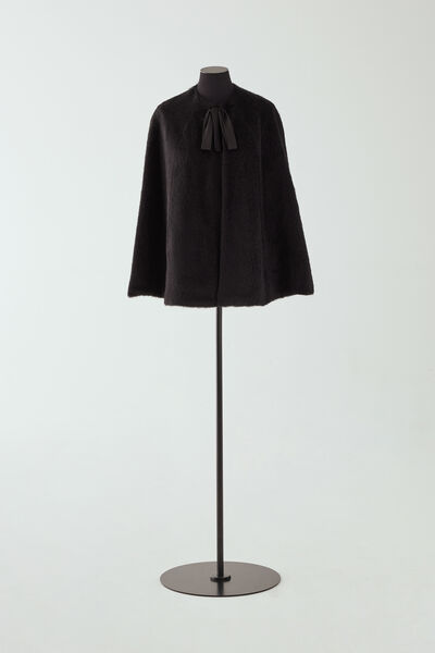 Faux fur cape with bow