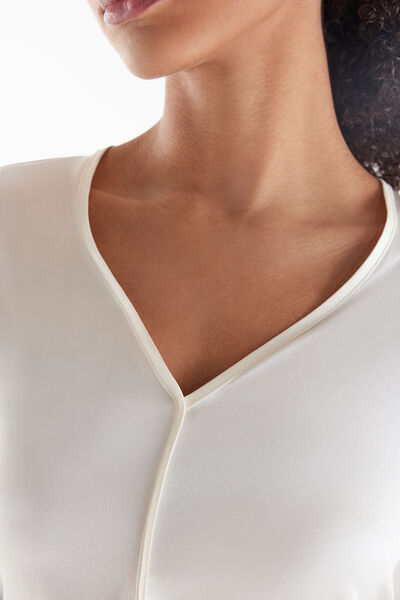Blusa in raso di seta con scollo a V