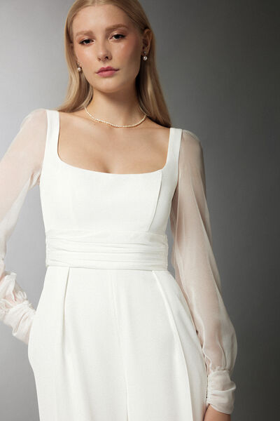 Tuta in crepe con maniche in chiffon